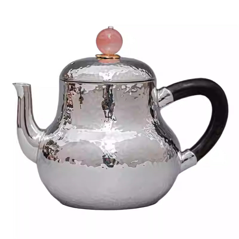 Pure silver mini teapot with dark handle and pink finial