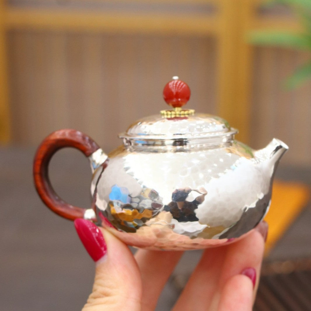 Collector mini silver teapot side view