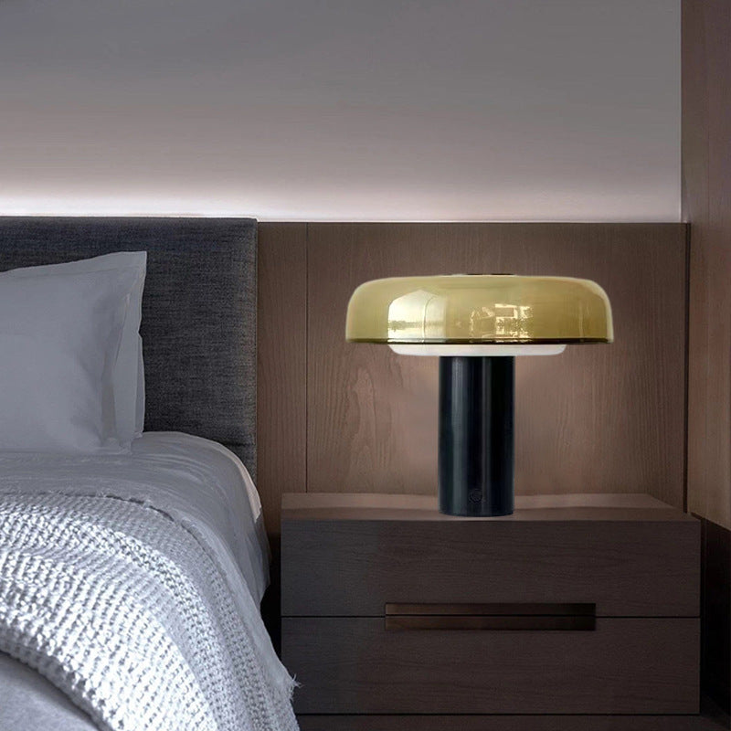 Amber glass mushroom bedside lamp on modern nightstand