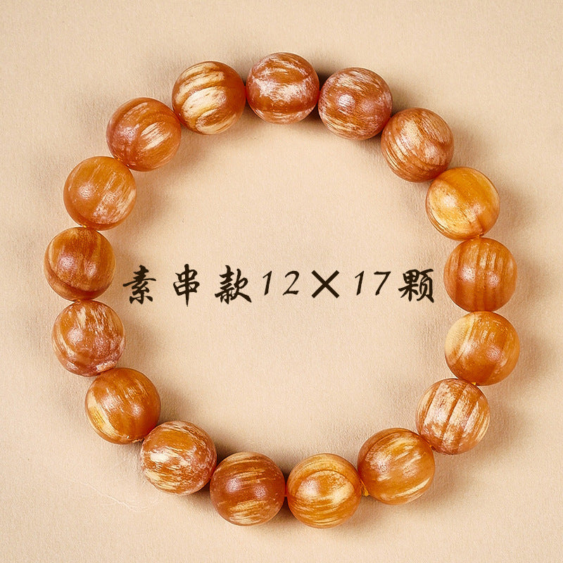 Amber-wood-style round bead bracelet 12mm x 17 beads with golden orange grain