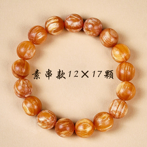 Amber-wood-style round bead bracelet 12mm x 17 beads with golden orange grain