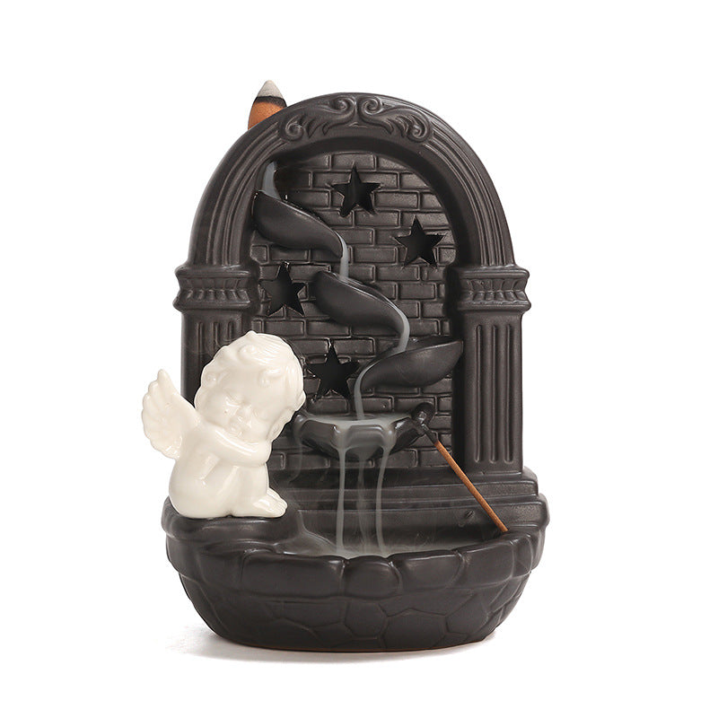 Angel arch backflow incense burner with waterfall channels and incense stick detail