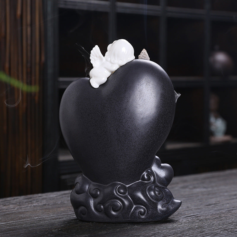 Heart cherub backflow incense burner rear sculptural view
