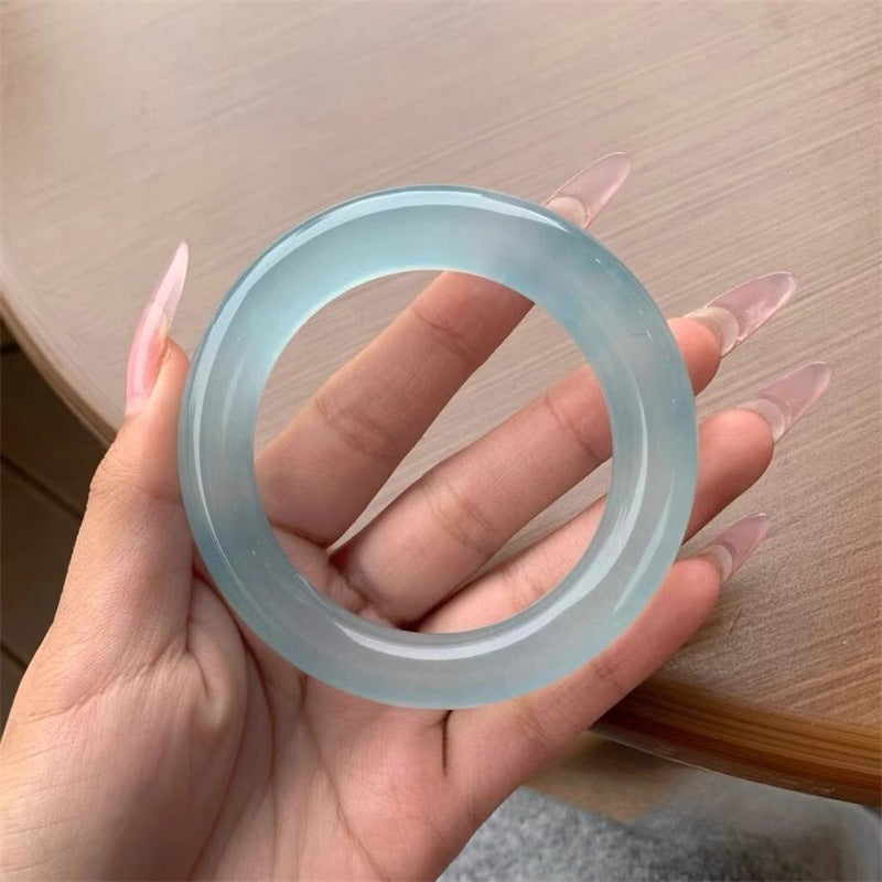 Translucent sky blue quartzite bangle polished thick round profile