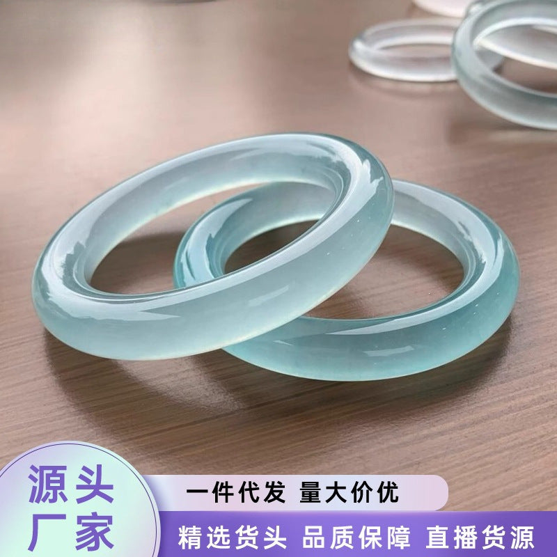 Polished Tianqing blue quartzite round bangle worn on hand
