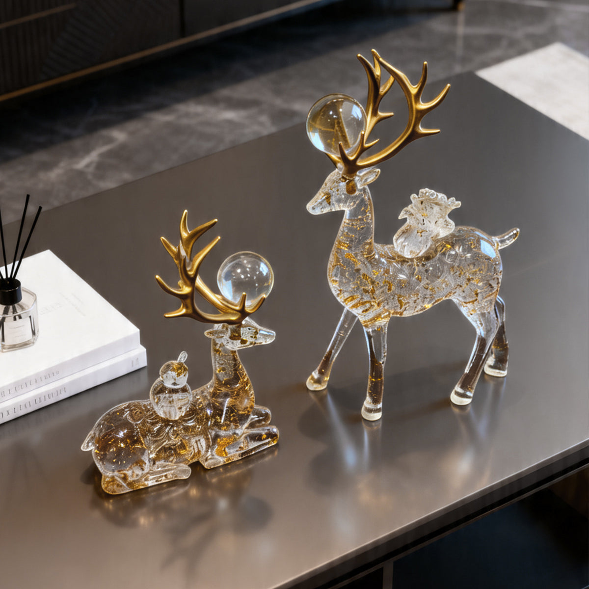 Luxury transparent deer statues with gold antlers and crystal ball accents