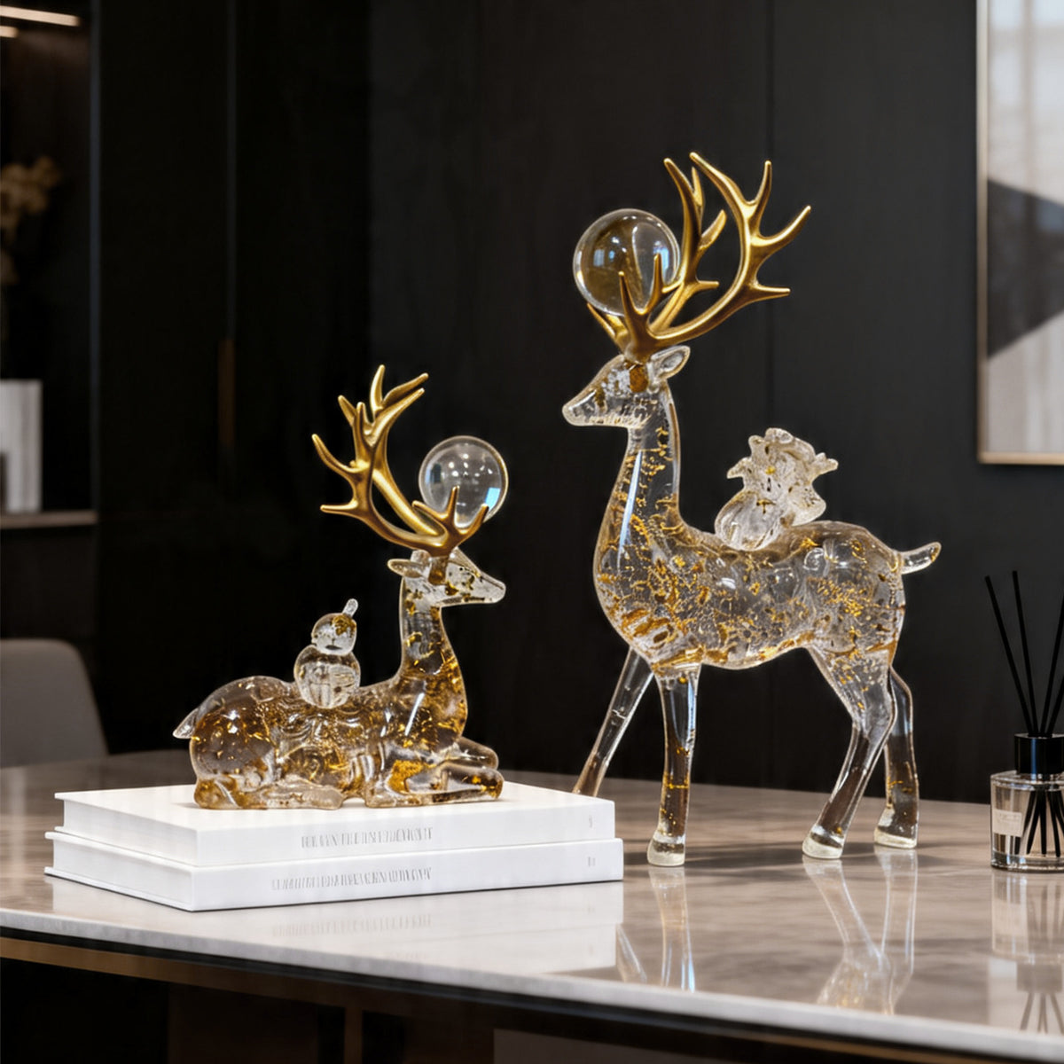 Gold-flake deer pair styled on a contemporary tabletop