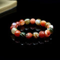 Multicolor banded agate round bead bracelet in orange green cream and brown