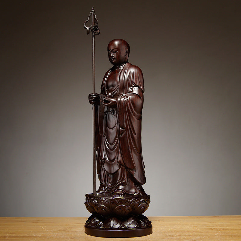 Detail view of black ebony Ksitigarbha Bodhisattva wood carving for Buddhist altar meditation and home decor