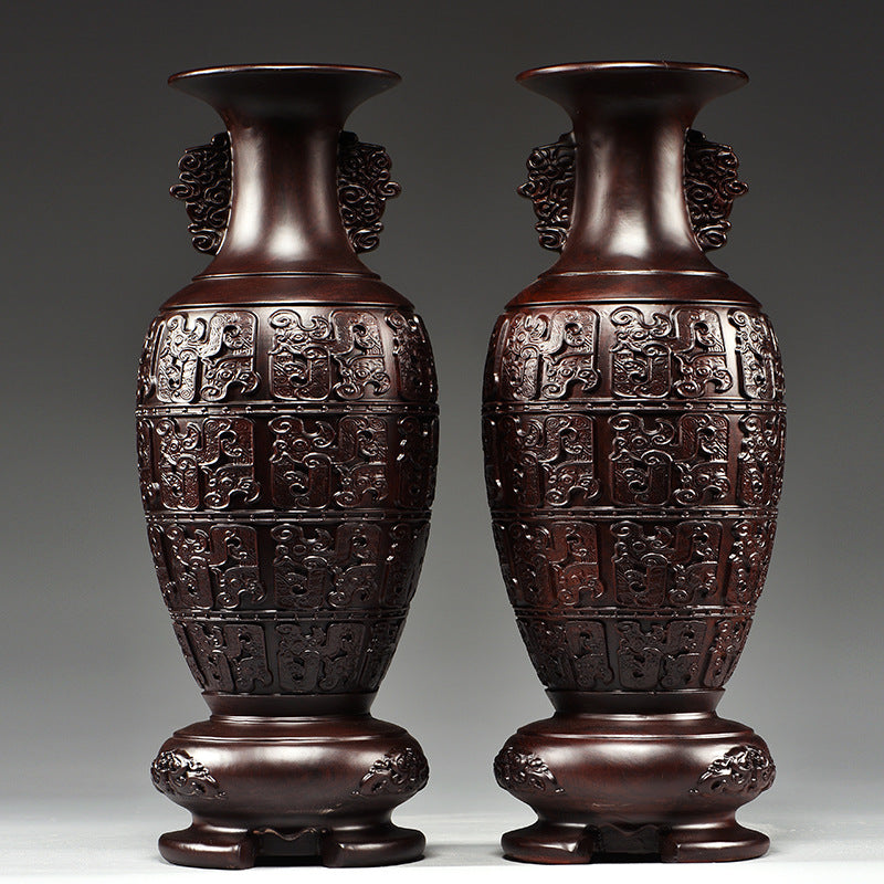 Pair of black ebony trade-name wood Han-style carved vases for symmetrical Chinese interior styling and housewarming decor