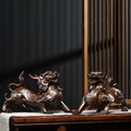 Pair of hand-carved black ebony wood Pixiu wealth beasts for entrance console office and business opening decor