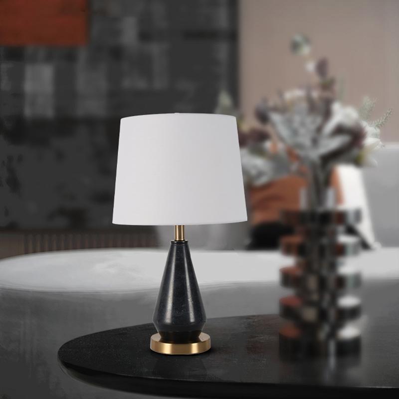 Black marble bedside lamp styled in a modern bedroom