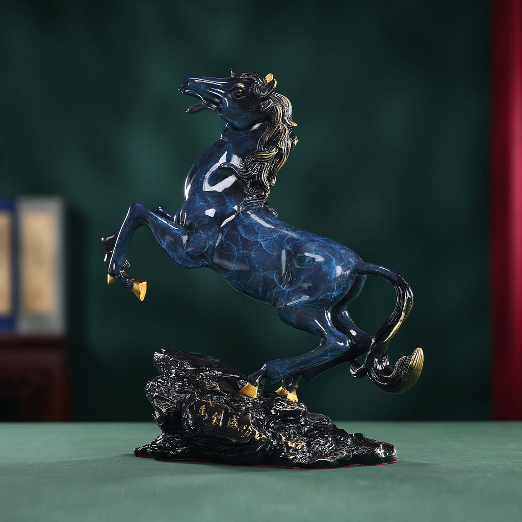 Blue patina copper rearing horse sculpture angled view with gold hoof accents