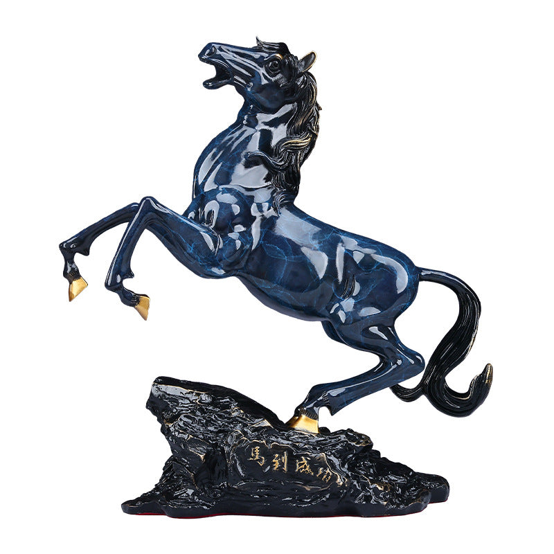 Blue rearing horse copper sculpture isolated on white background
