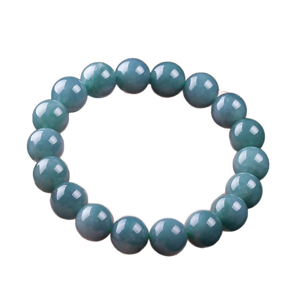 Natural blue water jadeite beads showing mineral clouds and polish