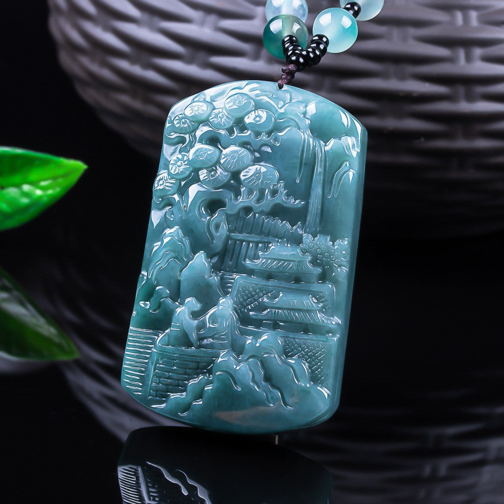 Large carved jadeite mountain landscape necklace with bead cord