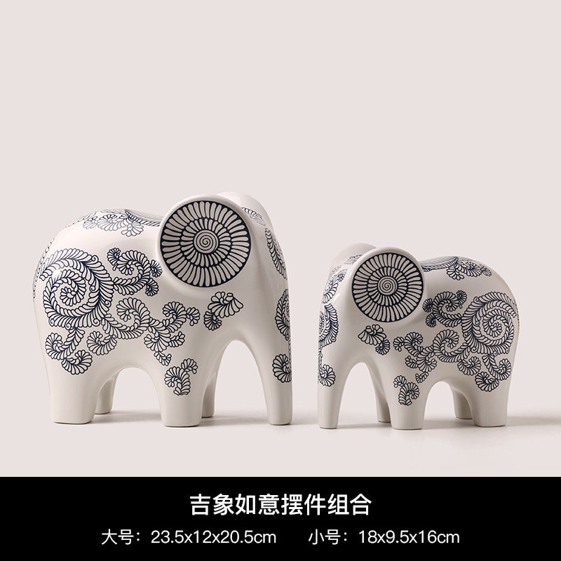 Pair of blue and white ceramic elephant ornaments