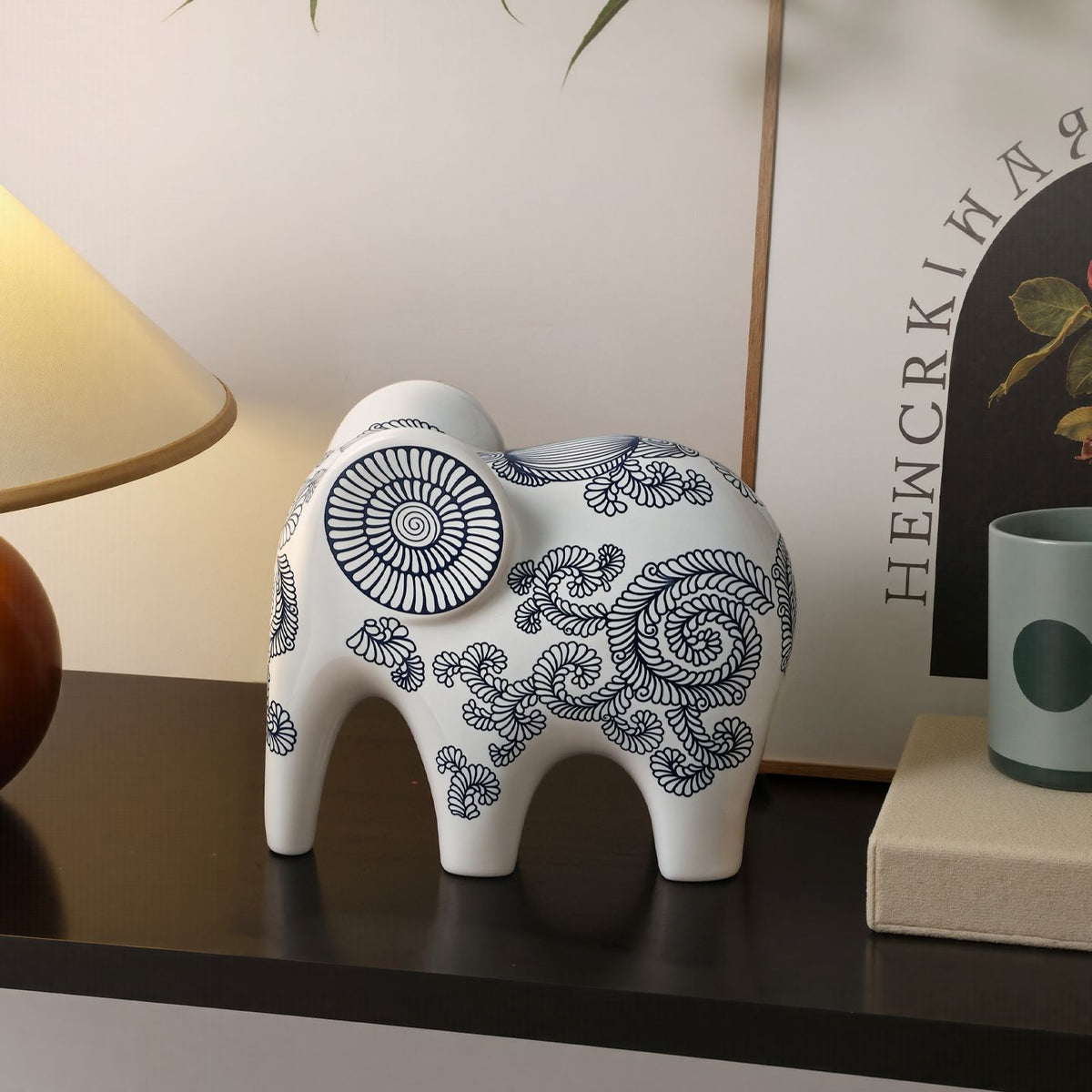 Blue white elephant figurine on console table