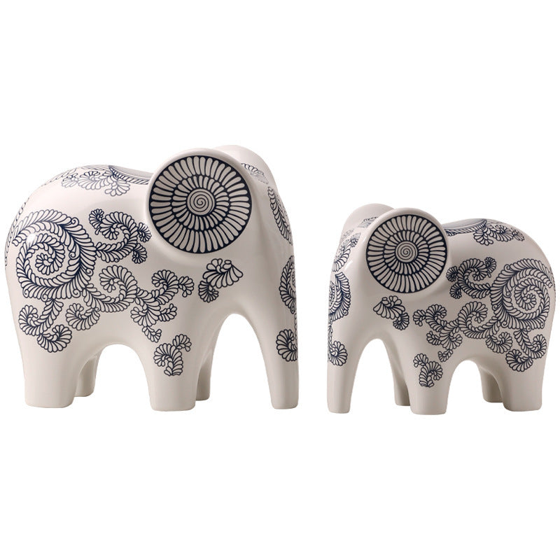 Large and small blue white ceramic elephant set