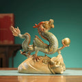 Large brass Chinese dragon Feng Shui sculpture on a gold fortune bag for home office and entrance decor