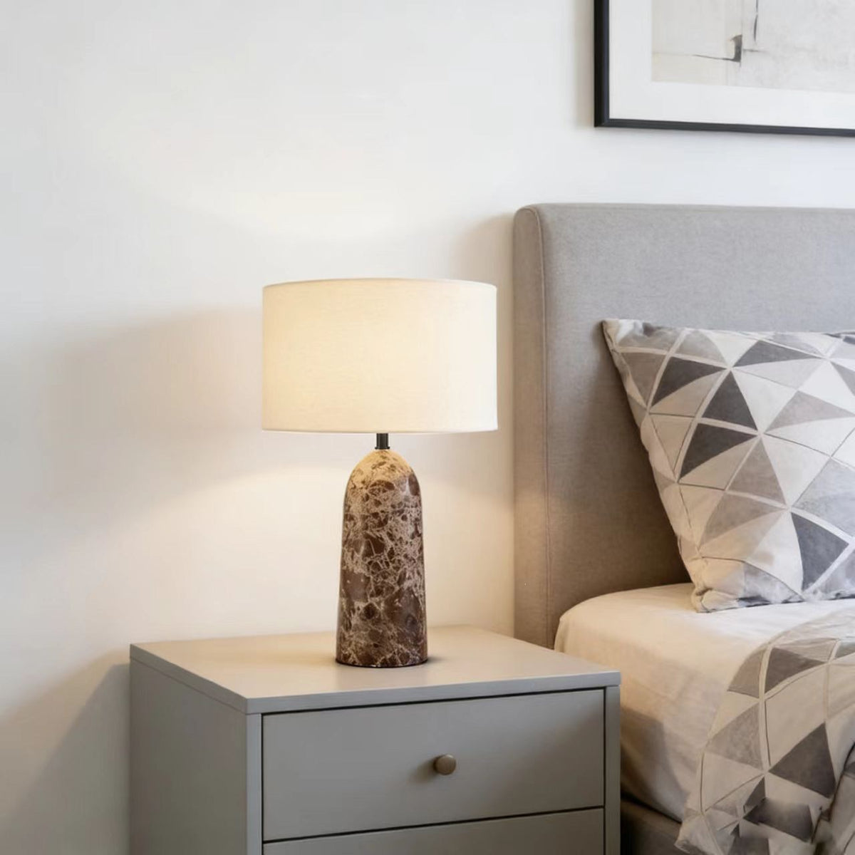 Brown natural marble bedside lamp in modern neutral bedroom