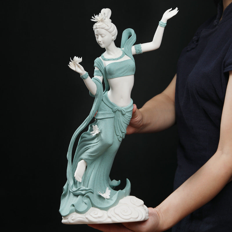 Large ceramic female dancer figurine with lotus and butterfly details for luxury decor