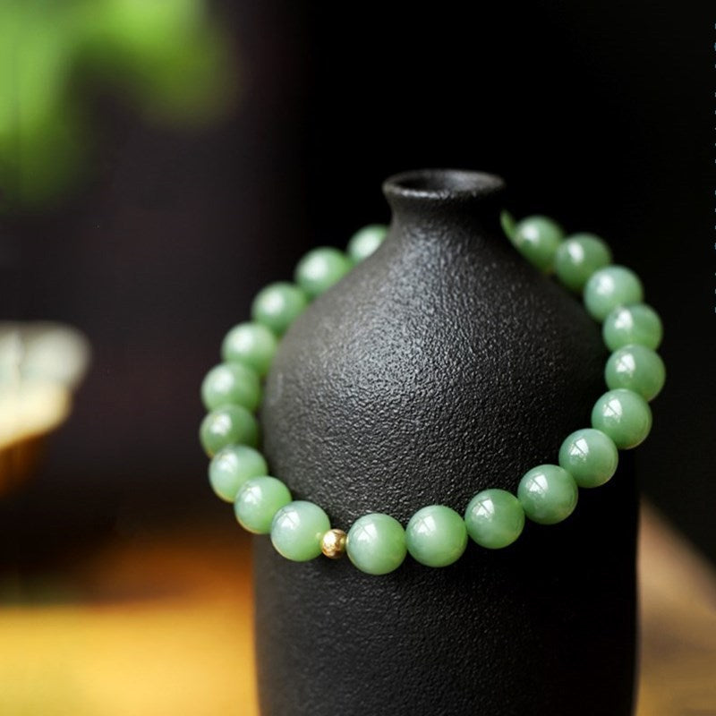 Natural Biyu 9 mm bead bracelet close up showing silky light band