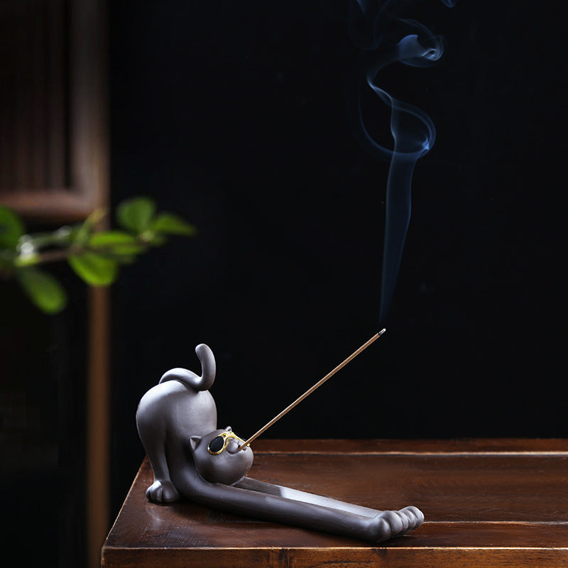 Playful cat incense stick holder with long ash catcher for desk and shelf