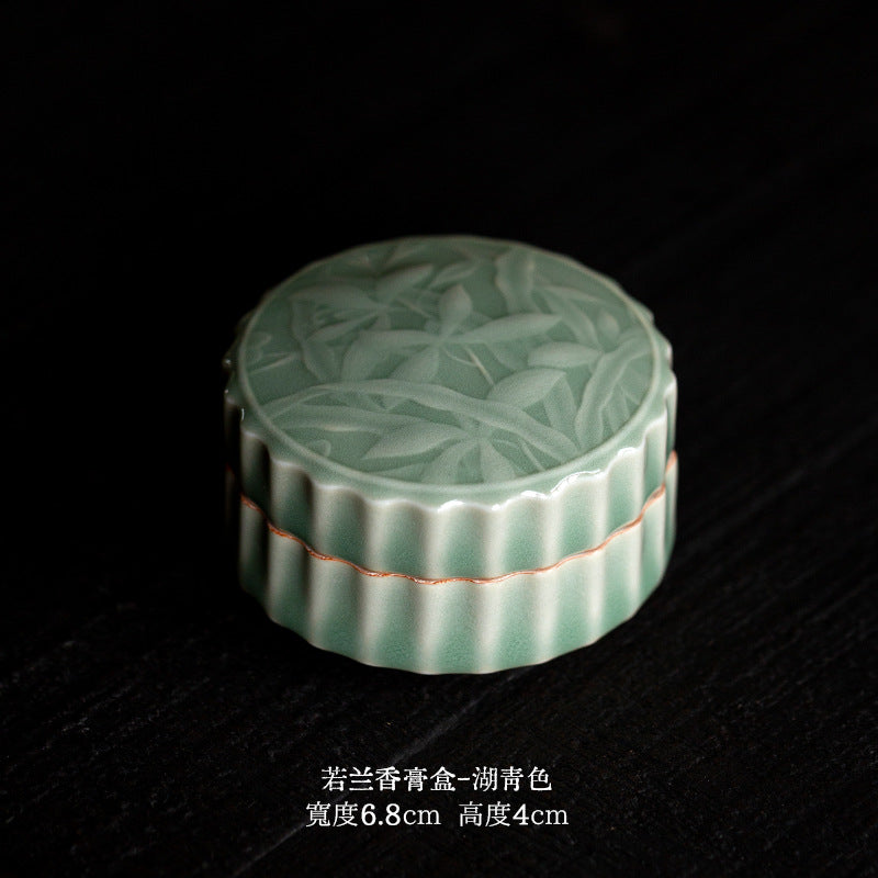 Lotus relief celadon lidded tea jar