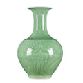 Celadon green carved lotus vase with elegant bottle form