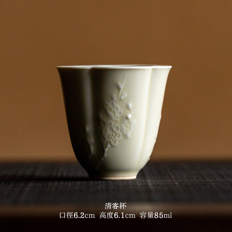 Relief carved celadon Chinese tea cup