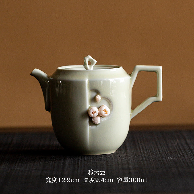 Celadon square handle Chinese teapot with floral detail