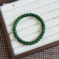 Certified deep green Hetian jade 6 millimeter round bead bracelet
