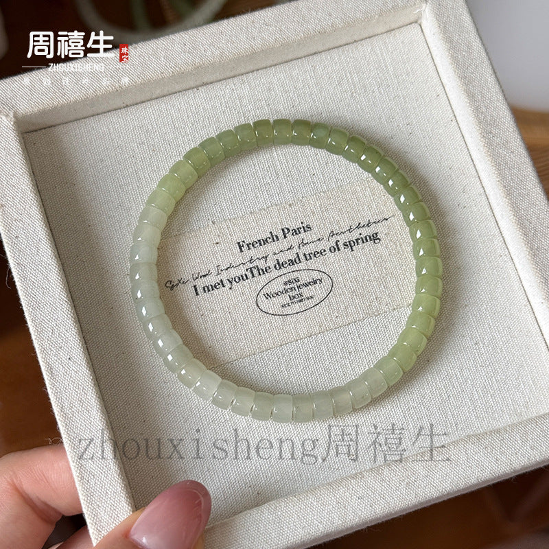 Pale green Hetian jade straight cut bead bracelet in presentation box