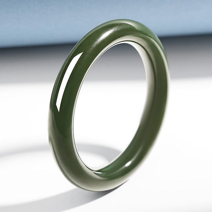 Lake green Hetian nephrite bangle close-up
