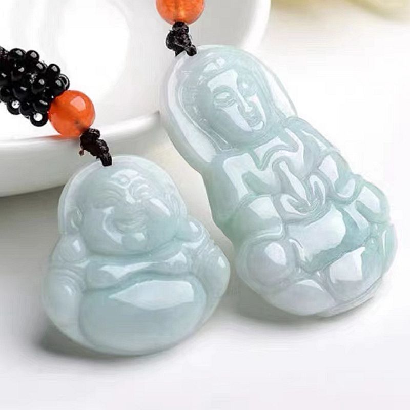 Pale green jade Guanyin and Buddha pendants together