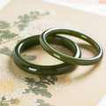 Certified natural Xinjiang Hetian jade bangles in deep lake and ink green