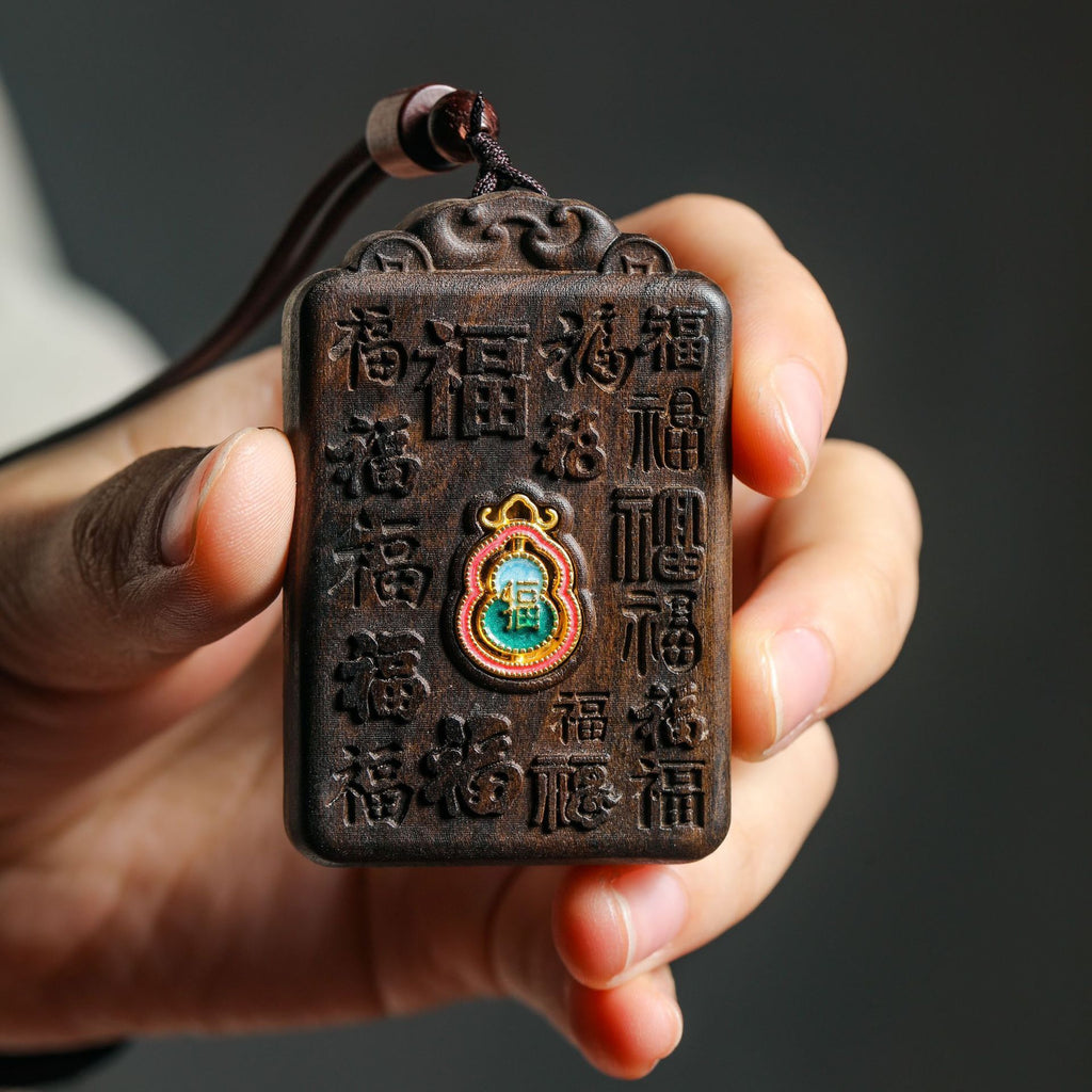 Chenxiang wood Hundred Blessings Chinese character plaque with colorful gourd-style inset