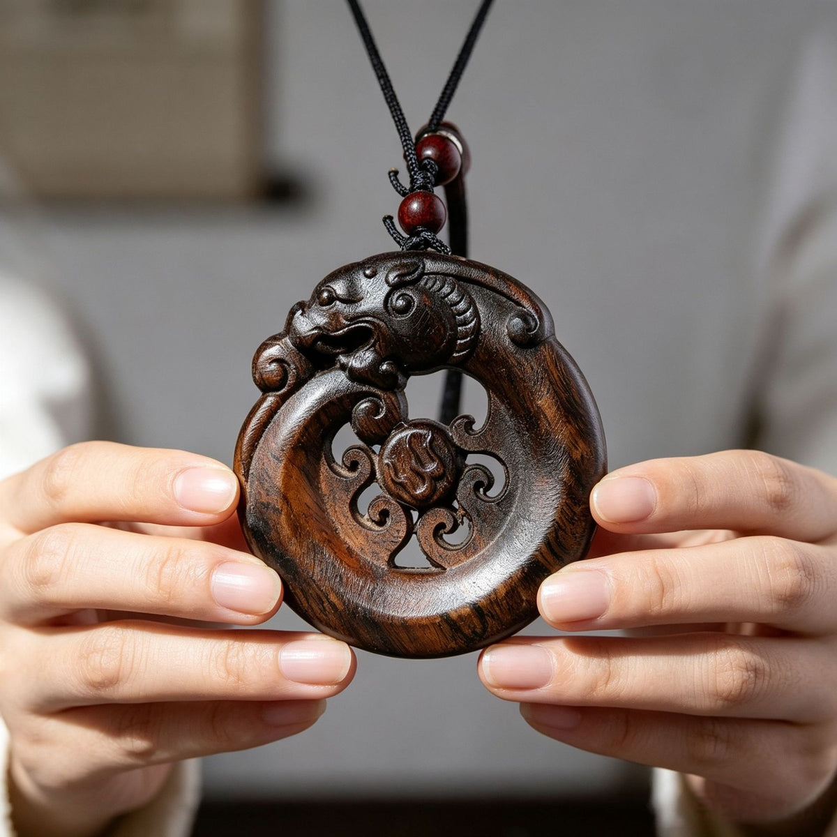 Chenxiang wood openwork Pixiu round peace buckle pendant with carved cloud motif
