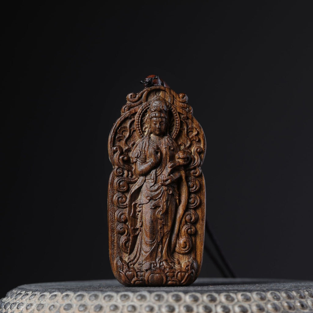 Chenxiang wood standing Guanyin pendant with lotus and cloud relief
