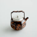 Chestnut brown kiln-transformed ceramic lift-handle teapot with silver-tone lid, 130ml