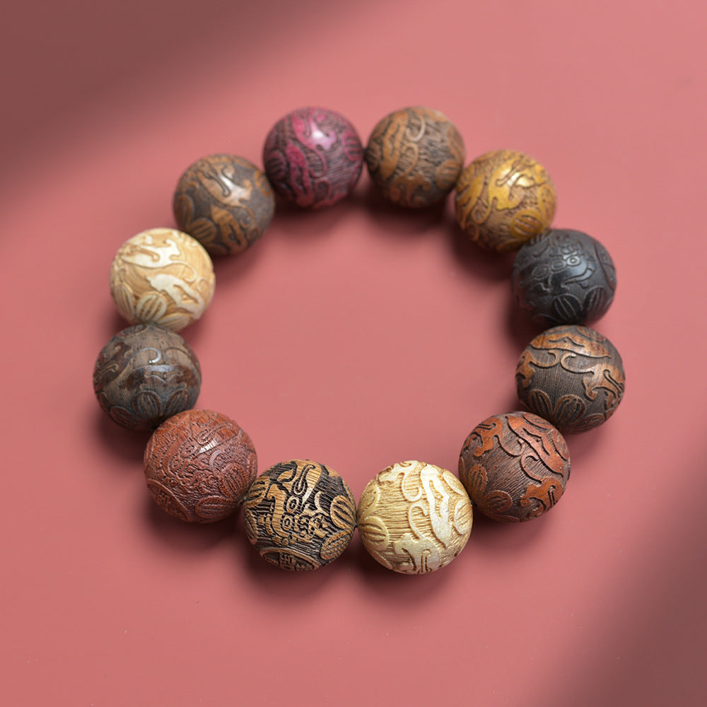 Chinese carved twelve-zodiac bracelet with 12 mixed wood-tone 20mm beads and auspicious animal relief motifs