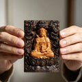 Chinese carved wood Buddhist plaque with seated figure and dragon relief