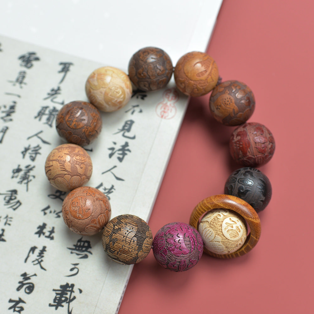 Chinese carved zodiac wenwan bracelet displayed beside calligraphy for tea room, study and cultural decor styling
