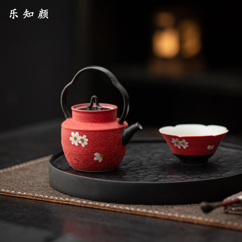Hand-painted lotus ceramic tea cup close-up