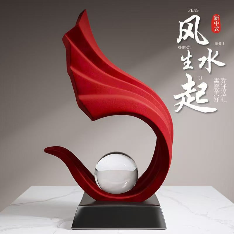 Abstract crystal ball sculptures shown as coordinated tabletop decor