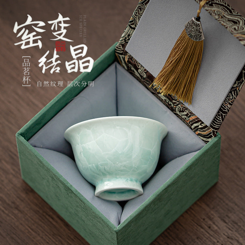Celadon green crystalline glaze ceramic tea cup in traditional presentation box