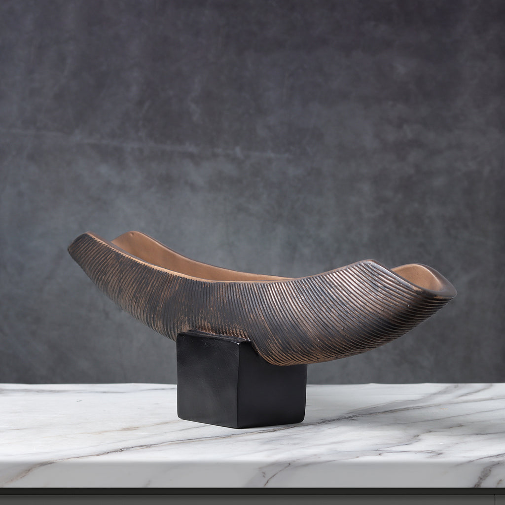 Textured ribbed abstract resin sculpture with distressed finish