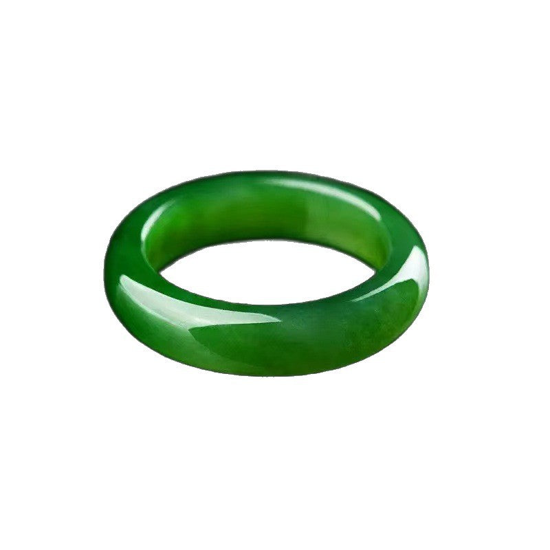 Deep green polished ring held in hand