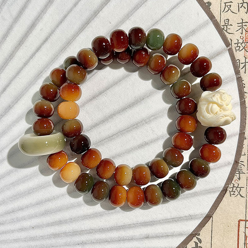 Dunhuang-style multicolor Bodhi root double-wrap bracelet with carved lion accent